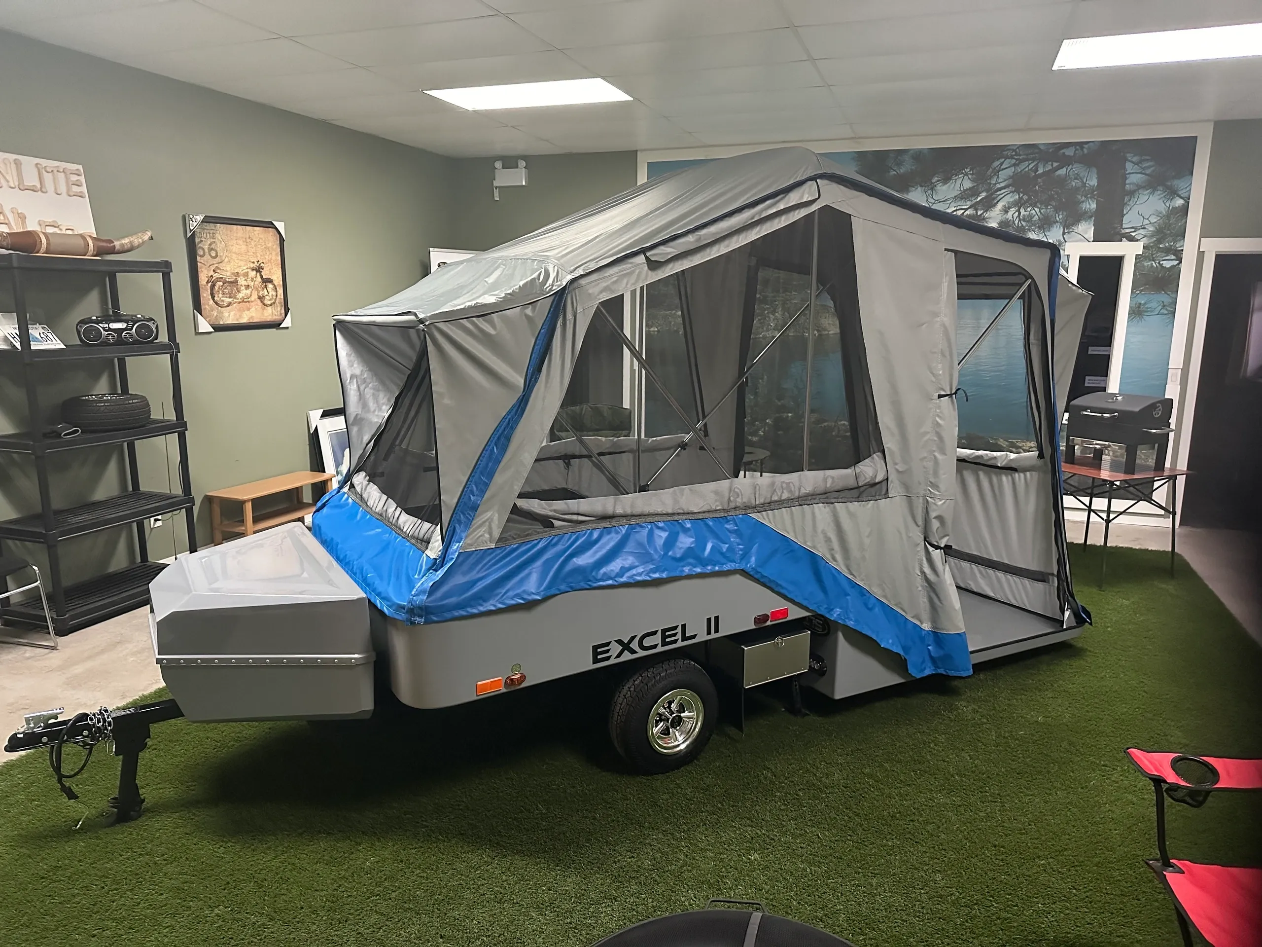 Excel tent trailer open in showroom Excel tent trailer open in showroom